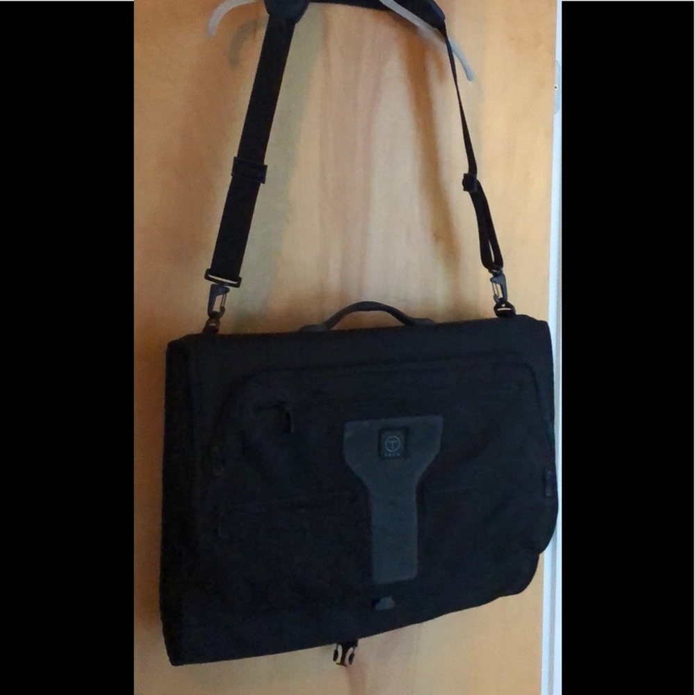 Tumi Black Travel Bag with Adjustable Strap